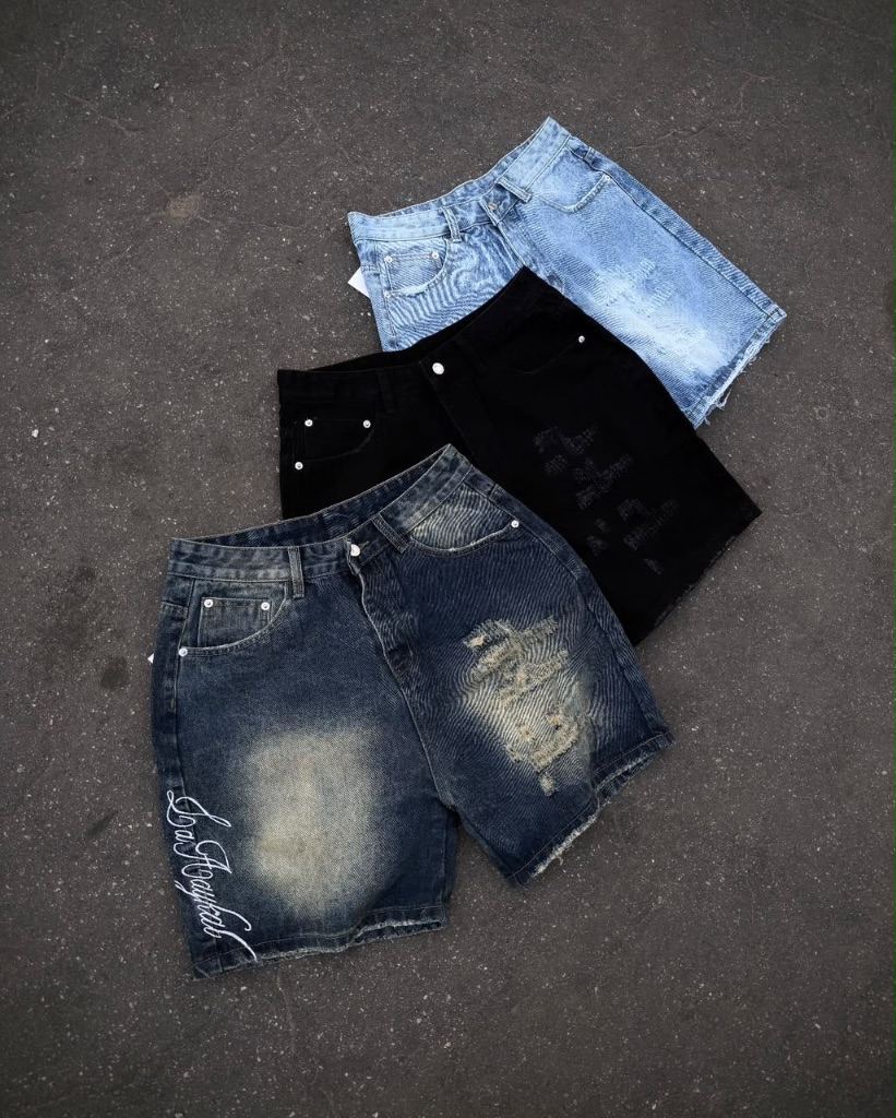 Distressed denim shorts