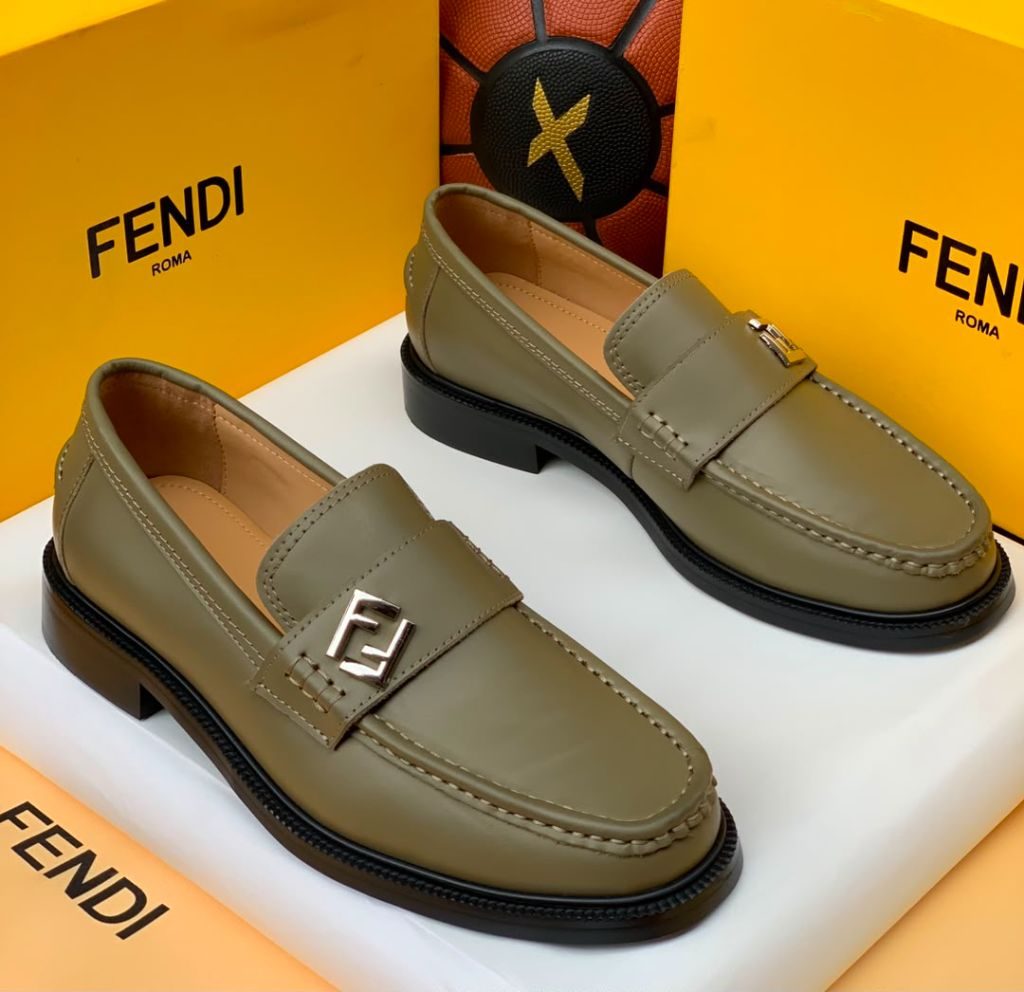 Green leather loafers